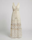 FJØRNA bohemian lace maxi dress with tiered skirt and tassel waist, flowing design for a stylish, relaxed look.