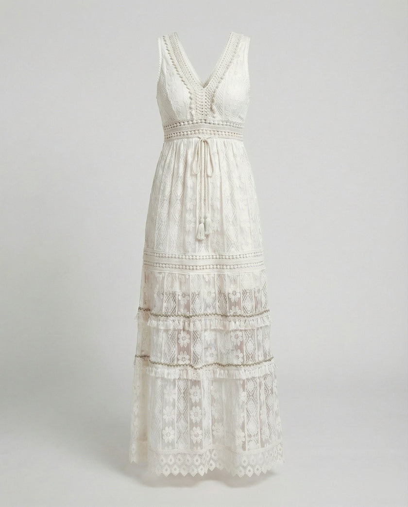 FJØRNA bohemian lace maxi dress with tiered skirt and tassel waist, flowing and detailed for a relaxed, stylish look.