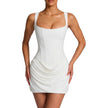 FJØRNA women's square neck ruched mini dress displayed on a model, featuring a fitted bodice and short length perfect for stylish occasions.