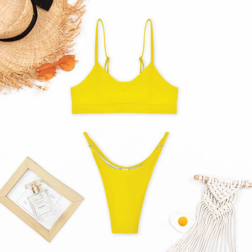 FJØRNA women's push-up bikini swimwear with a vibrant beach design, perfect for summer and poolside lounging.