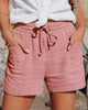 FJØRNA lightweight summer women's shorts with wide leg design, drawstring waist, and front pockets, perfect for warm weather.