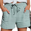 FJØRNA women's lightweight summer shorts with wide legs, drawstring waist, and front pockets, perfect for warm-weather casual wear.