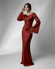 FJØRNA satin maxi dress for women with elegant bell sleeves, rich rust color, form-fitting silhouette, and luxurious fabric.