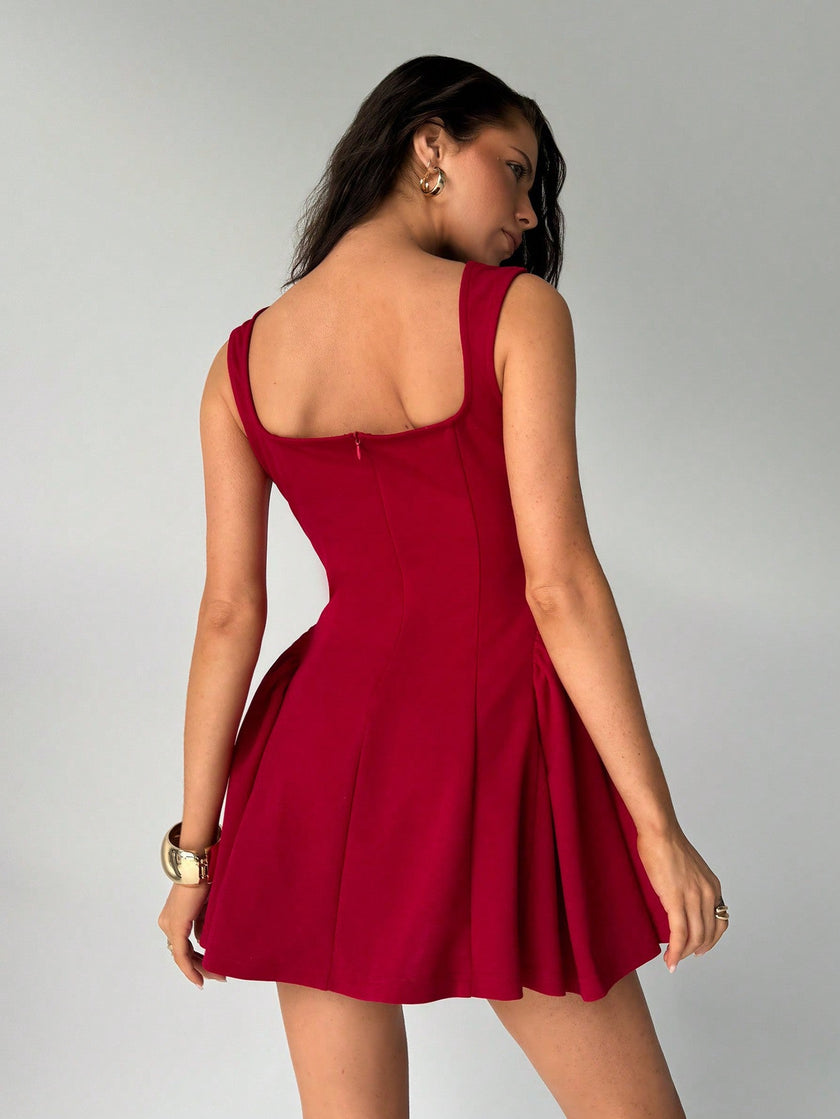 FJØRNA red flared fit summer dress with square neckline, back view, tailored black accents, perfect for warm weather.