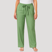 FJØRNA Reyna women's wide-leg pants with drawstring waist, relaxed fit, and lightweight fabric, shown on a model.