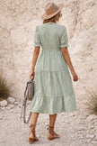 Sage green bohemian maxi dress by FJØRNA with flowing fabric and relaxed fit, perfect for casual or boho-inspired styles.