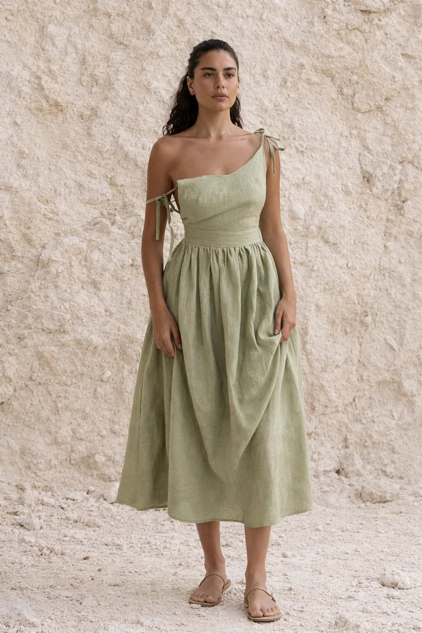 Sage green boho maxi dress by FJØRNA with flowing fabric and relaxed fit, perfect for casual summer wear.