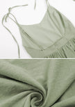 Sage green boho maxi dress by FJØRNA featuring flowing fabric and bohemian style, perfect for casual or summer wear.