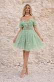 FJØRNA green sage bustier dress with fitted bodice and elegant design, lightweight fabric, and sleeveless style.