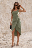 Sage green FJØRNA chic dress with elegant design, featuring a flowing silhouette and stylish details for sophisticated occasions.