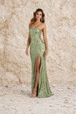 Sage green floral dress by FJØRNA, featuring a flowing design with floral patterns and long sleeves.