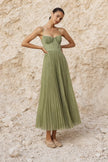 Sage green pleated midi dress from FJØRNA featuring a flowing silhouette and elegant pleats.