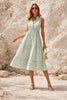Sage green striped midi dress by FJØRNA featuring a flowing silhouette and elegant design, perfect for casual or semi-formal wear.