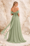 FJØRNA sage green multiway convertible dress with multiple wearing styles, displayed as a versatile, elegant dress on a mannequin.