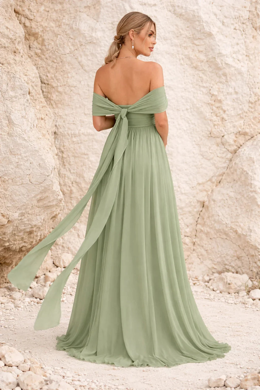 FJØRNA sage green multiway convertible dress with multiple wearing styles, displayed as a versatile, elegant dress on a mannequin.