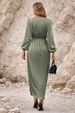 FJØRNA sage green long sleeve dress with a flowing silhouette and elegant design, perfect for casual or semi-formal wear.