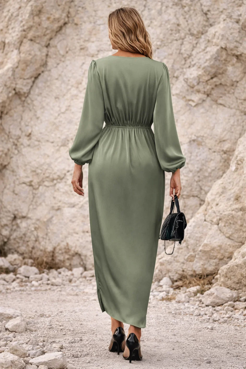 FJØRNA sage green long sleeve dress with a flowing silhouette and elegant design, perfect for casual or semi-formal wear.
