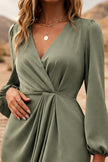 FJØRNA sage green long sleeve dress with a relaxed fit, featuring a flowy silhouette and subtle fabric texture.