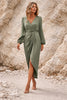 Sage green long sleeve FJØRNA dress with a flowing silhouette and elegant design, perfect for casual or semi-formal wear.