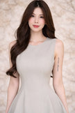 Sage green FJØRNA women's dress with a flowy silhouette, long sleeves, and elegant neckline, perfect for casual or semi-formal wear.