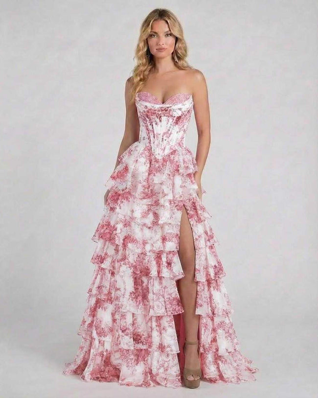 Pink floral tiered chiffon maxi dress by FJØRNA, elegant wedding guest gown with a romantic, flowing design and floral details.
