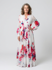 FJØRNA women's floral summer maxi dress with long sleeves and wrap design, featuring vibrant flower patterns.