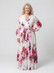 FJØRNA women's floral summer maxi dress with long sleeves and wrap design, flowing and elegant for warm weather.