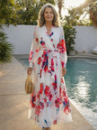 FJØRNA women's floral summer maxi dress with long sleeves, wrap style, flowing fabric, perfect for warm weather occasions.
