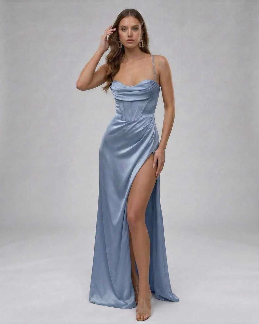 Blue satin maxi dress for women by FJØRNA featuring a high slit and elegant silhouette with a silky finish.