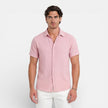 Men's short sleeve linen cotton blend shirt by FJØRNA, breathable summer fit, casual men's shirt displayed on a hanger.