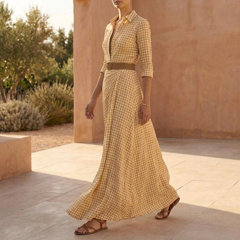 FJØRNA belted wrap collared A-line maxi shirt dress for women, shown from side view with button details and flowing fabric.