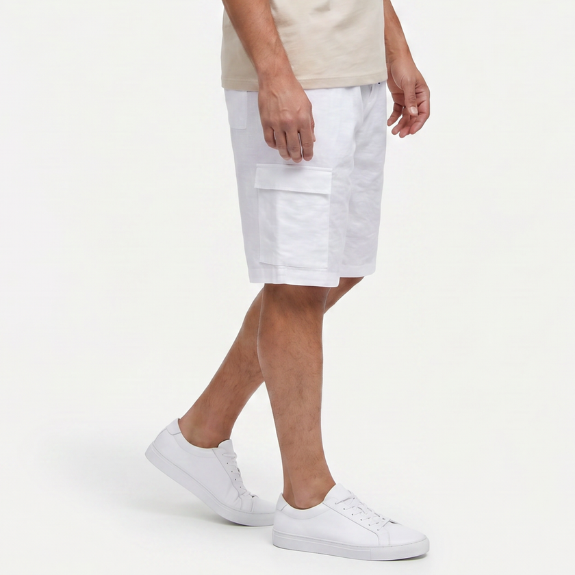 Men's linen cargo shorts with drawstring waist by FJØRNA, shown from the side, featuring multiple cargo pockets and a relaxed fit.