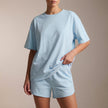 Sky blue FJØRNA summer two-piece women's co-ord set with drawstring details, featuring a stylish crop top and matching shorts.