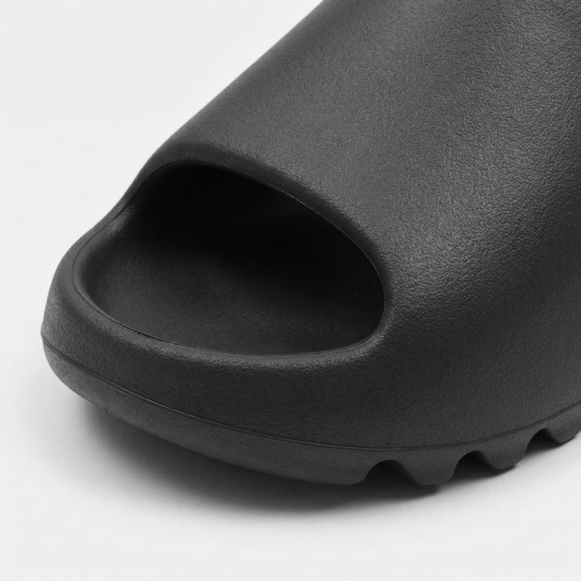 FJØRNA men's open toe slide slippers with cushioned footbed and casual slip-on design for comfortable everyday wear.