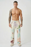 FJØRNA Painted Trousers in black, stylish women's pants with artistic painted design, full-length, casual yet chic fit.