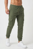 FJØRNA cargo jogger trousers in army green displayed on a model, featuring relaxed fit, multiple pockets, and elastic cuffs.