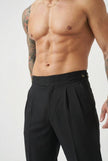 FJØRNA tailored black trousers displayed on a hanger with a clean, modern background for stylish office wear.