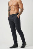 FJØRNA slim-fit blue trousers displayed flat, showing tailored waistband and modern slim-leg design for a stylish look.