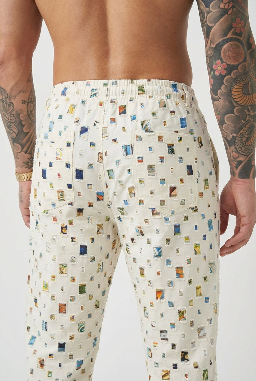 FJØRNA straight-fit white trousers displayed on a model, showcasing a sleek, tailored design and modern style.
