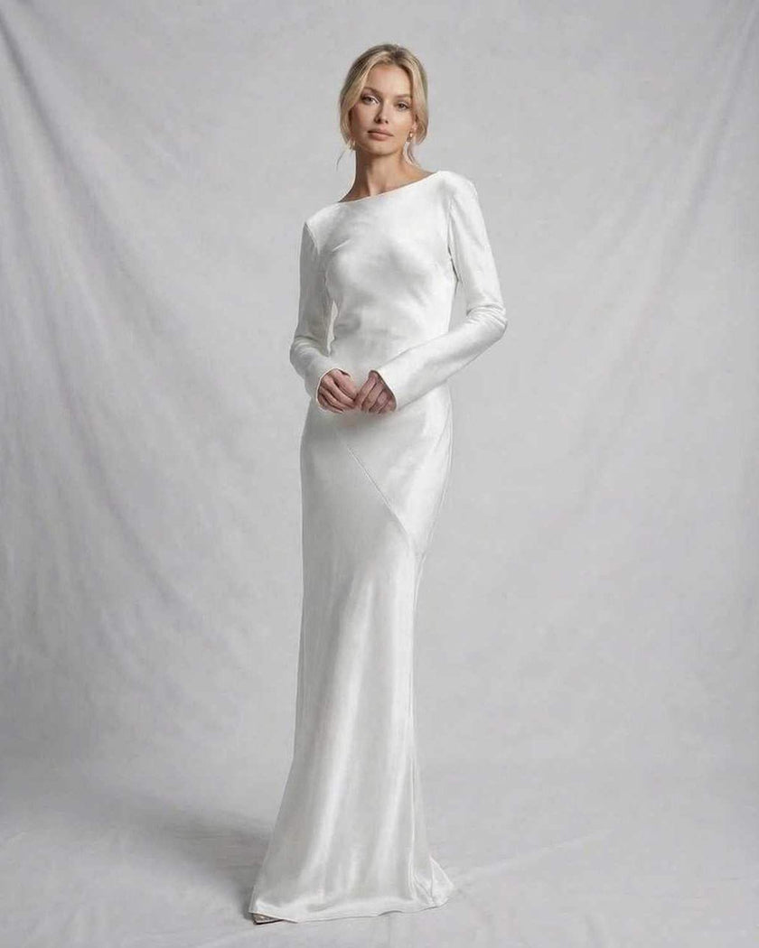 Ivory satin maxi dress for women by FJØRNA featuring long sleeves and elegant, luxurious design.