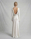 Ivory satin maxi dress for women by FJØRNA featuring a low draped back and slim fit, elegant and stylish for formal occasions.