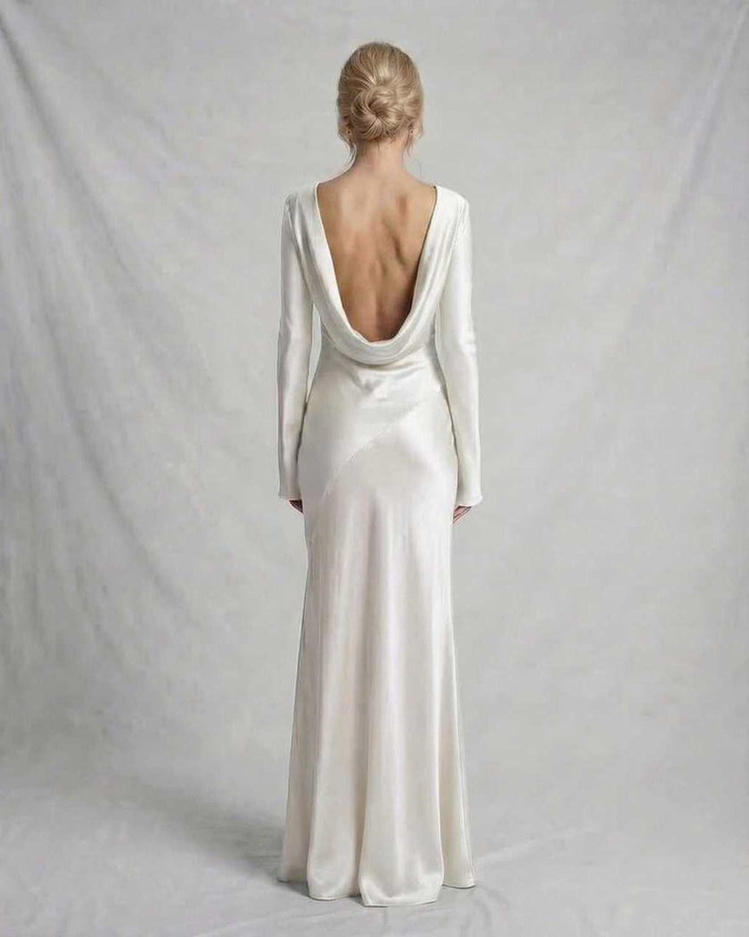 Ivory satin maxi dress for women by FJØRNA featuring a low draped back and slim fit, elegant and stylish for formal occasions.