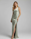 Women’s sage green satin maxi dress by FJØRNA, featuring an asymmetrical one-shoulder design and elegant flowing fabric.