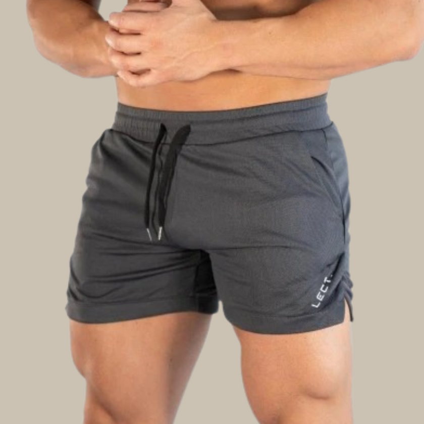 Men's sporty swim shorts by FJØRNA, slim fit men's swimwear with a sleek, short design perfect for active beach days.