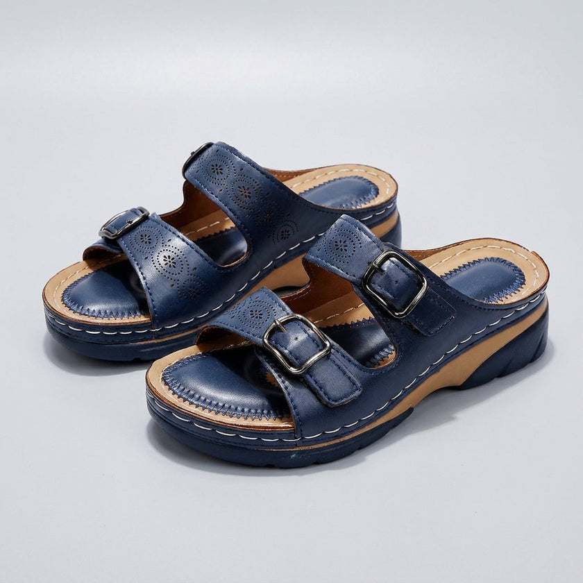 Blue FJØRNA orthopedic buckle platform slide sandals for women with cushioned straps and chunky soles, ideal for comfort and style.