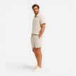 Men's lightweight summer set by FJØRNA featuring a breathable shirt and shorts, ideal for warm weather.