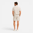 Men's lightweight summer set by FJØRNA, featuring breathable shirt and shorts for warm weather wear.