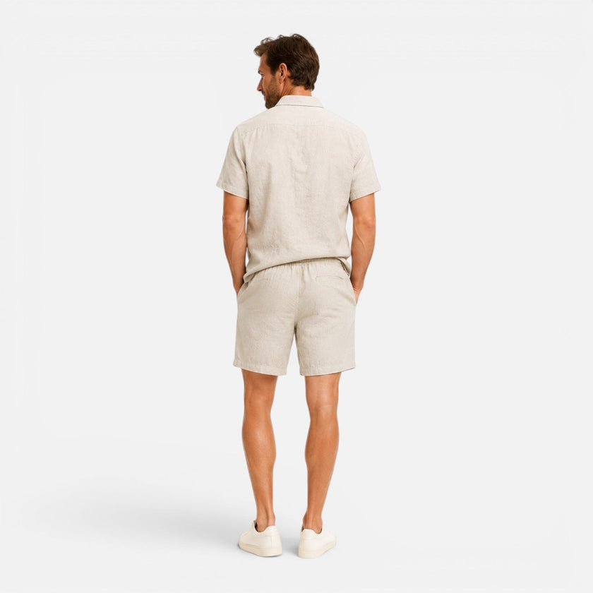 Men's lightweight summer set by FJØRNA, featuring breathable shirt and shorts for warm weather wear.