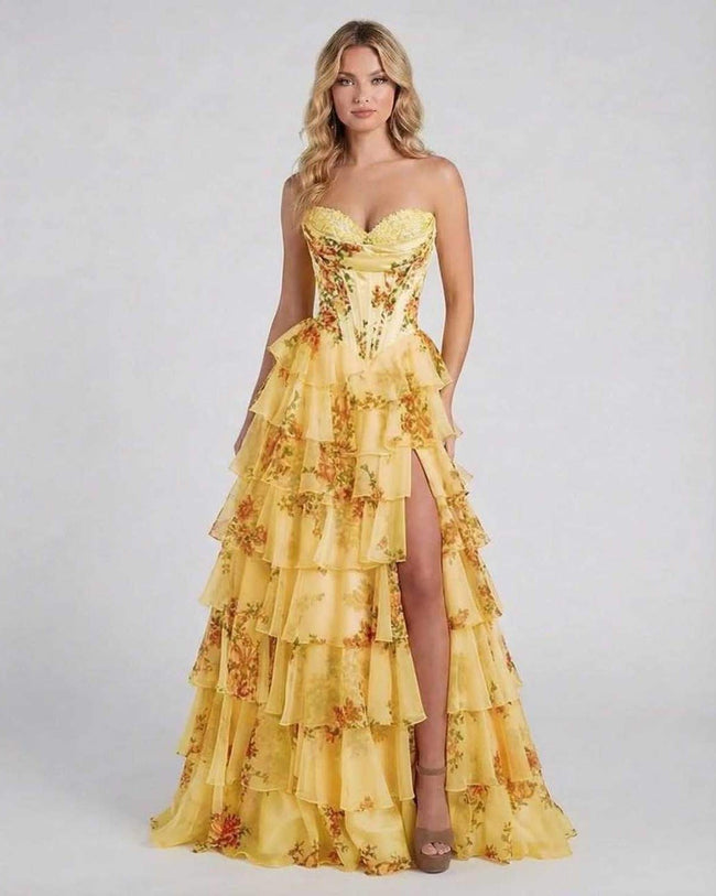 Yellow floral chiffon maxi dress for women by FJØRNA, strapless with tiered design, perfect for romantic sunset occasions.