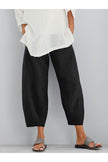 FJØRNA women's lightweight summer tapered trousers with elastic waist, loose fit, cropped, breathable fabric for warm weather.